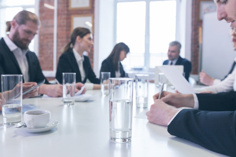 team discussing documents in office