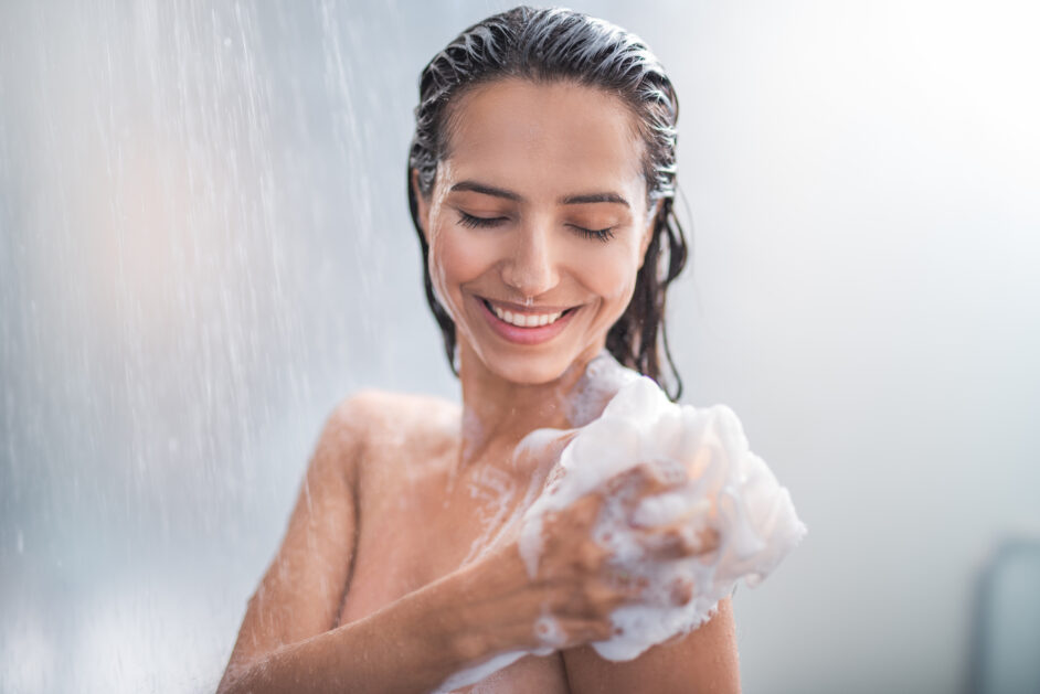 female rubbing body with foam