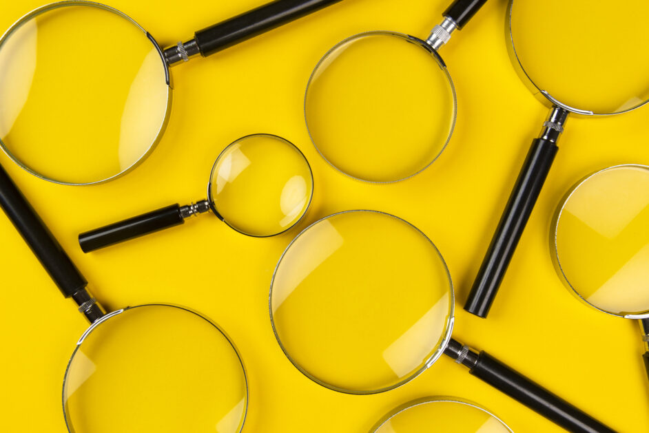 magnifying glasses on the yellow background