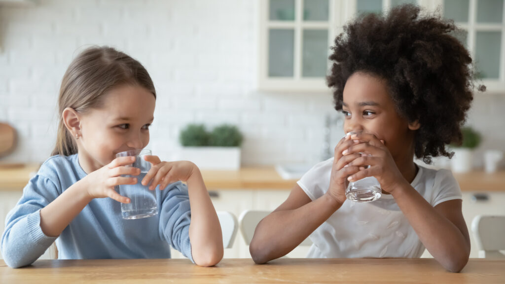 sisters drinking drink pure mineral water